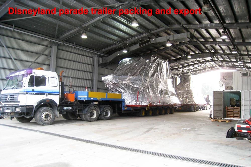 2015-03-16 Disney Floats loading to barge.JPG