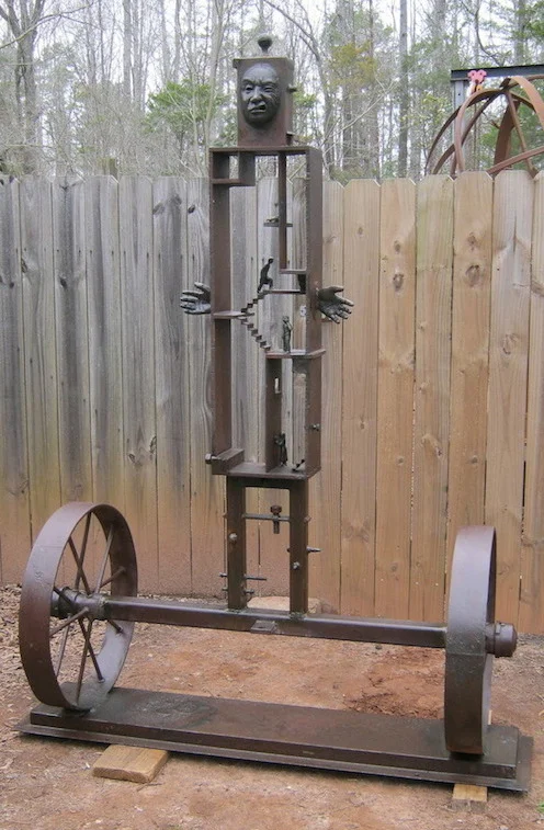   Urban Man II &nbsp;&nbsp;steel and bronze, 7’ high, 