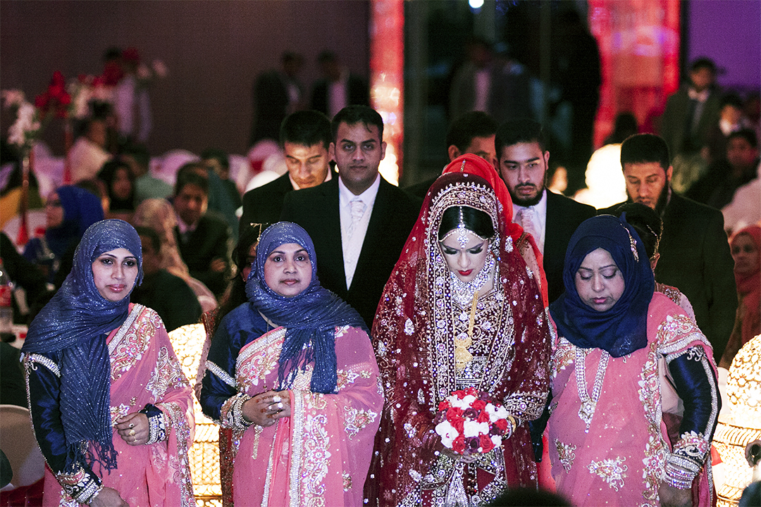 Journey to the Stage Throughout the brides journey to the stage where her groom awaits, she does not look up, and keeps her eyes modestly to the floor.