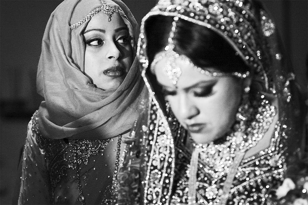 The Bride and Groom Leave Leaving the venue, family accompanies the nervous bride from the venue.