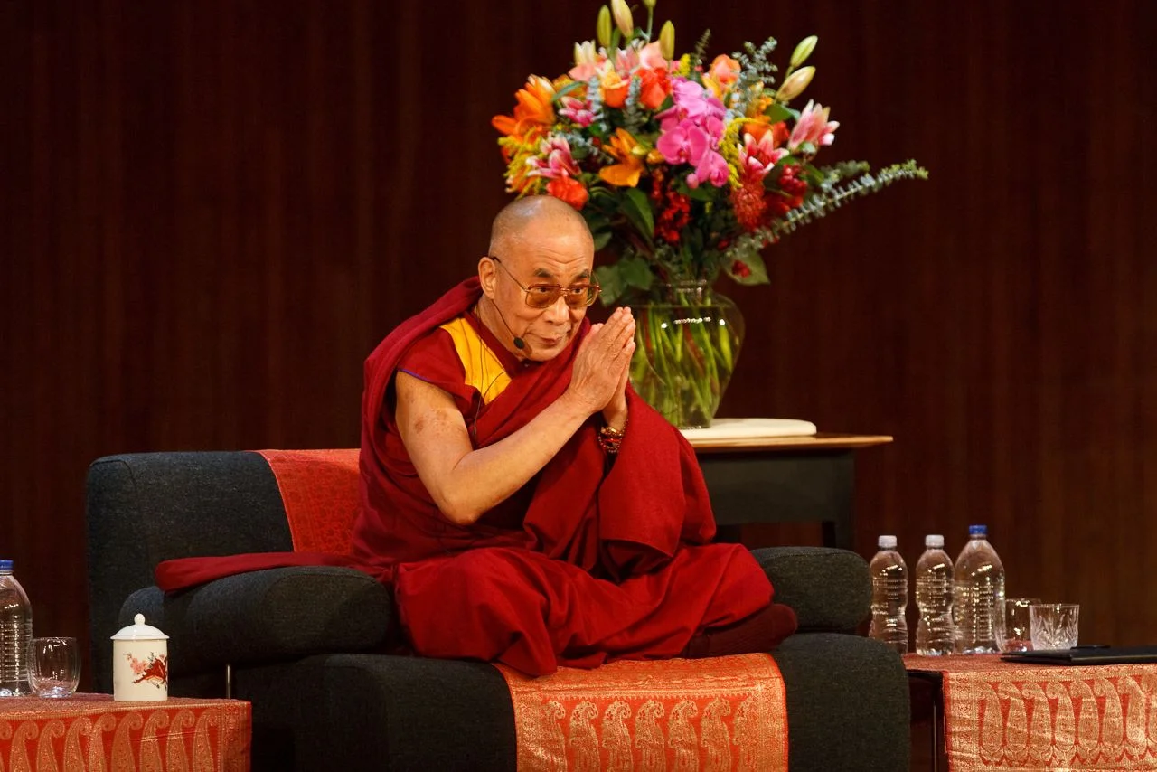 THE DALAI LAMA GIVING A TALK WITH OUR SHAKER NIGHTSTANDS BY HIS SIDE. BOSTON MA, 2008.