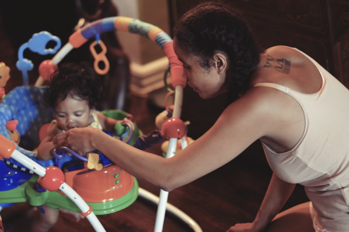 Do you ever worry about raising her in New York? Here she has a Caribbean community where she might not feel weird about having a mother with an accent. Or a mother who’s gay, or two mothers who are gay, I don’t know what will happen in the future. 