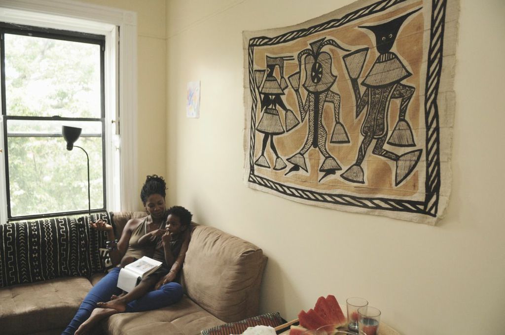 Kakembo was close to losing her own creative spirit before she started ORIGINS Style, a line of modern wax print and batik home goods, in 2011. “Around this same time I was really craving to have my creative side active again because prior to graduate school and my current job, I was always making something,” Kakembo recalls. Before going on a work-related trip to Dakar, Senegal, her son’s grandmother Juliet asked her to bring her back fabric to have skirts made. Along with getting the fabric for her godmother, Kakembo couldn’t help but get something for herself. “I was excited and overwhelmed with all the fabrics in the market!” Kakembo remembers, laughing. “I had no idea what I was going to do with it; I just knew they were gorgeous and relatively inexpensive.