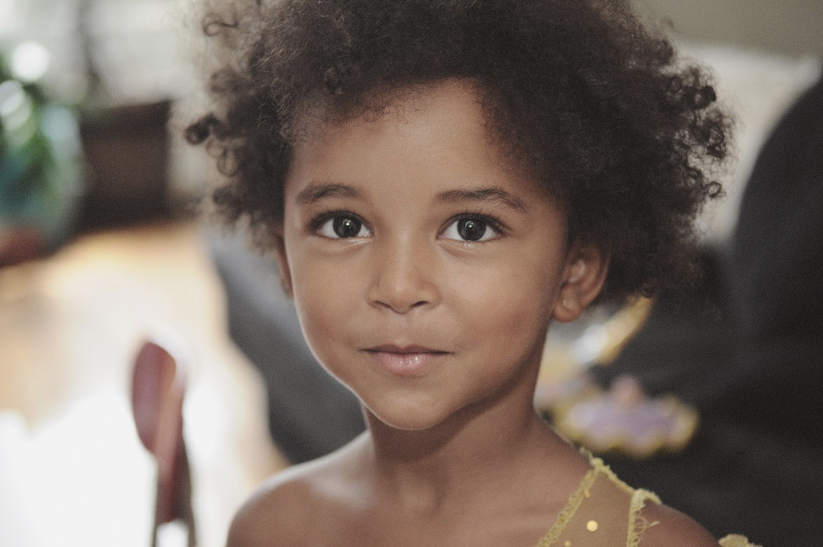 As Mutu finishes her thought, Neema has put on her favorite yellow dress, the cutaway cap sleeves barely staying up on her slender shoulders. She takes her mother’s hand and they leave Mutu’s studio behind, heading into another world of make believe. “Momma, there’s a monster coming!” Neema screams, a mischievous grin lighting up her face