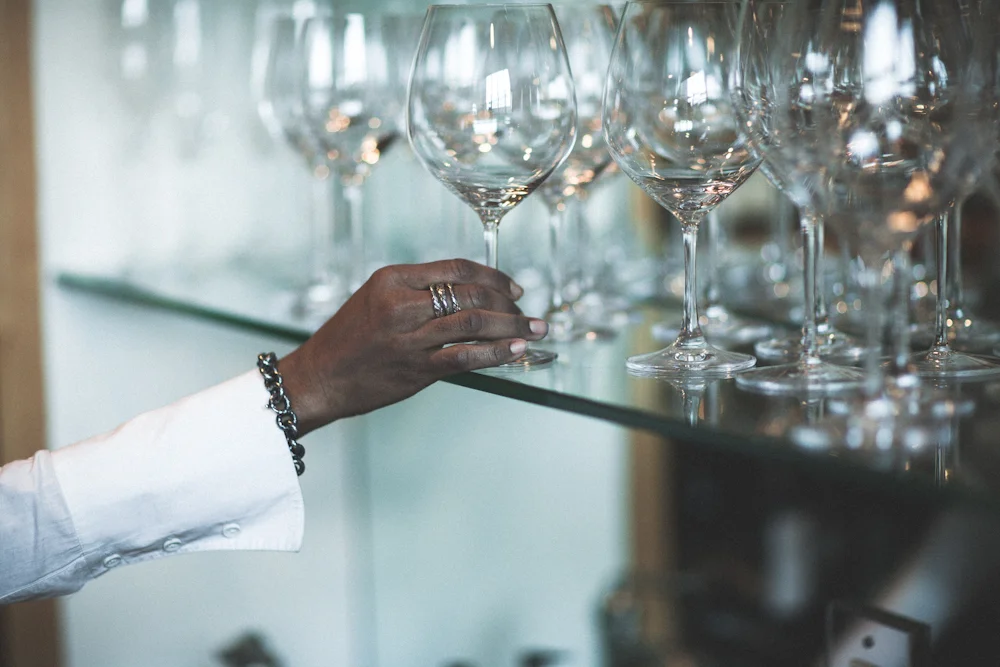 A longtime fan of vineyard tours and wine tastings, Black decided to pursue her foodie interests; in 2001 Black took classes at the American Sommelier Association and became a certified sommelier. “I had friends who were coming to me, asking me for advice on what wines they should get,” she recalls. “If they're having a party, what they should pair with this or that, if they were buying a gift for somebody, what should they get? I thought, ‘This is a business opportunity.’”