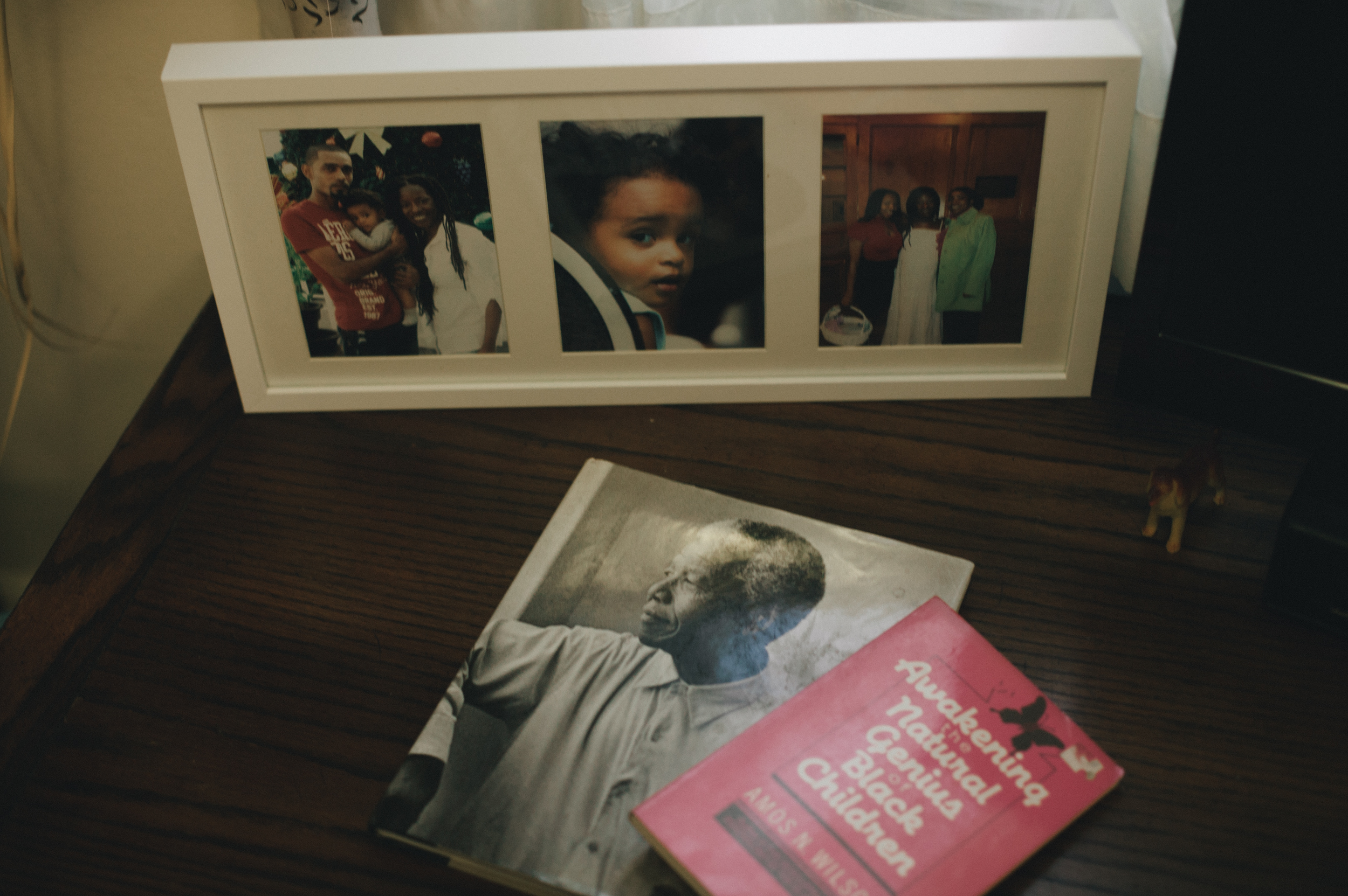 What is the best advice your mother, or the mothers in your life, have given you? I can’t think of anything they’ve necessarily said, because some of it is old Caribbean nonsense like, “He’s two days old—don’t pick him up yet! Stop spoiling him now.” (Laughs) But what these women have shown me is how to love their children, unconditionally. They have walked away from harsh relationships with men, and certain supposed stabilities and securities, in order to stand by their children. Family photos in Shiloh's bedroom .