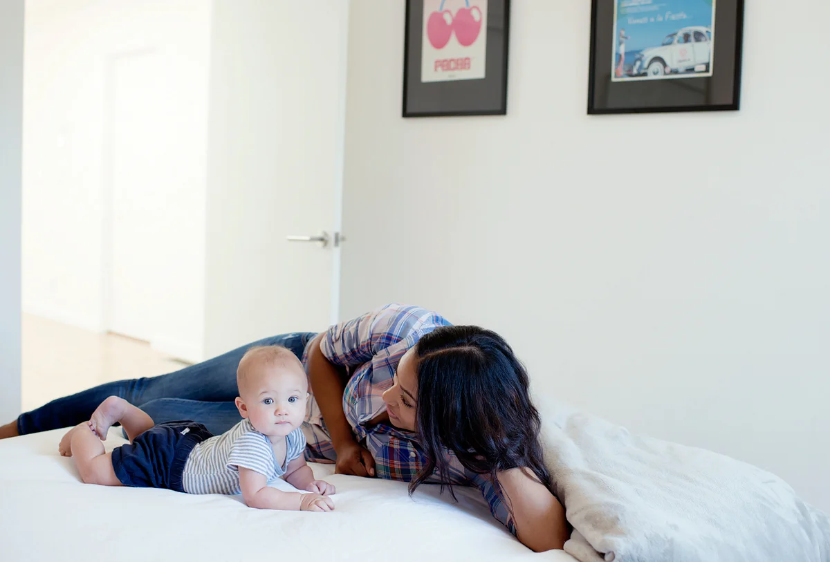 The couple tried for four months, and when Adams learned she was pregnant, it felt “surreal,” she says. “When we went for that first appointment and saw his heartbeat, I remember looking at the doctor and saying ‘Oh, now it’s for real.’” Her pregnancy was “pretty easy.” “In the beginning, I felt a little nauseous here and there. I tried to stay fit but cheeseburgers and French toast became my best friends,” she says, laughing. “My husband was like, ‘Okay, now I’m putting on the pounds.’ All we were eating were cheeseburgers.”