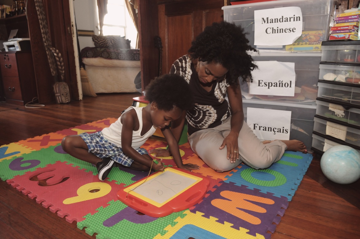 Performer Rhonda Ross Kendrick with her son Raif. Raif speaks four languages. 