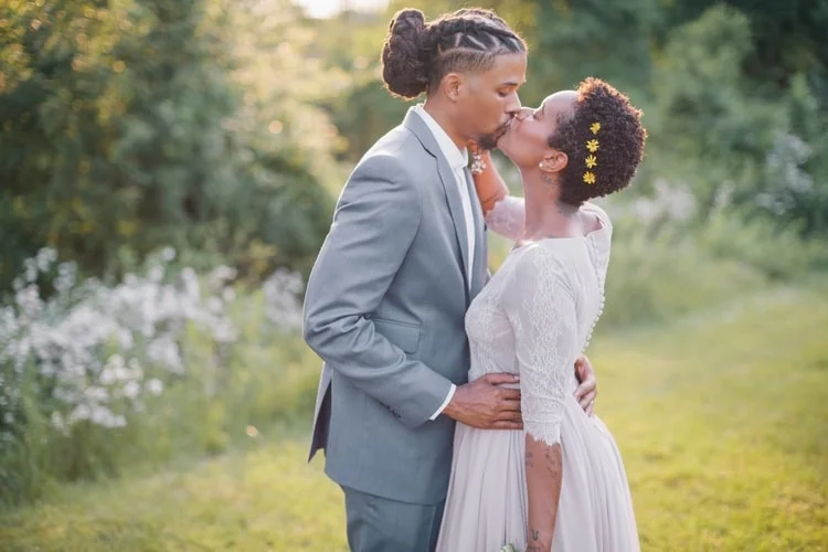 Alex Elle and her husband Ryan on their wedding day. Photo credit: Erika Layne Photography