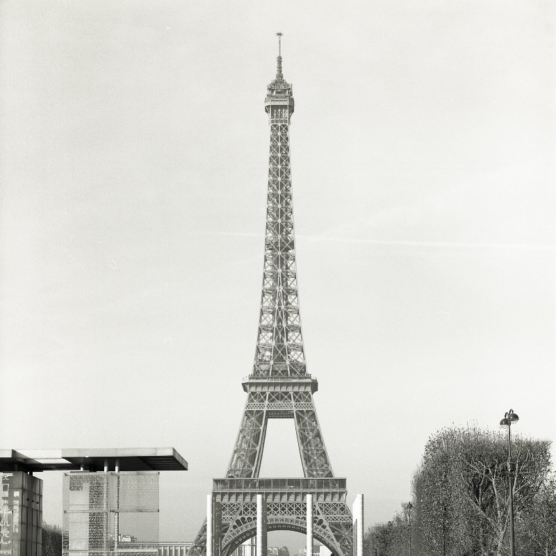 The Eiffel Tower, viewed from the far end of the Champ de Mars.