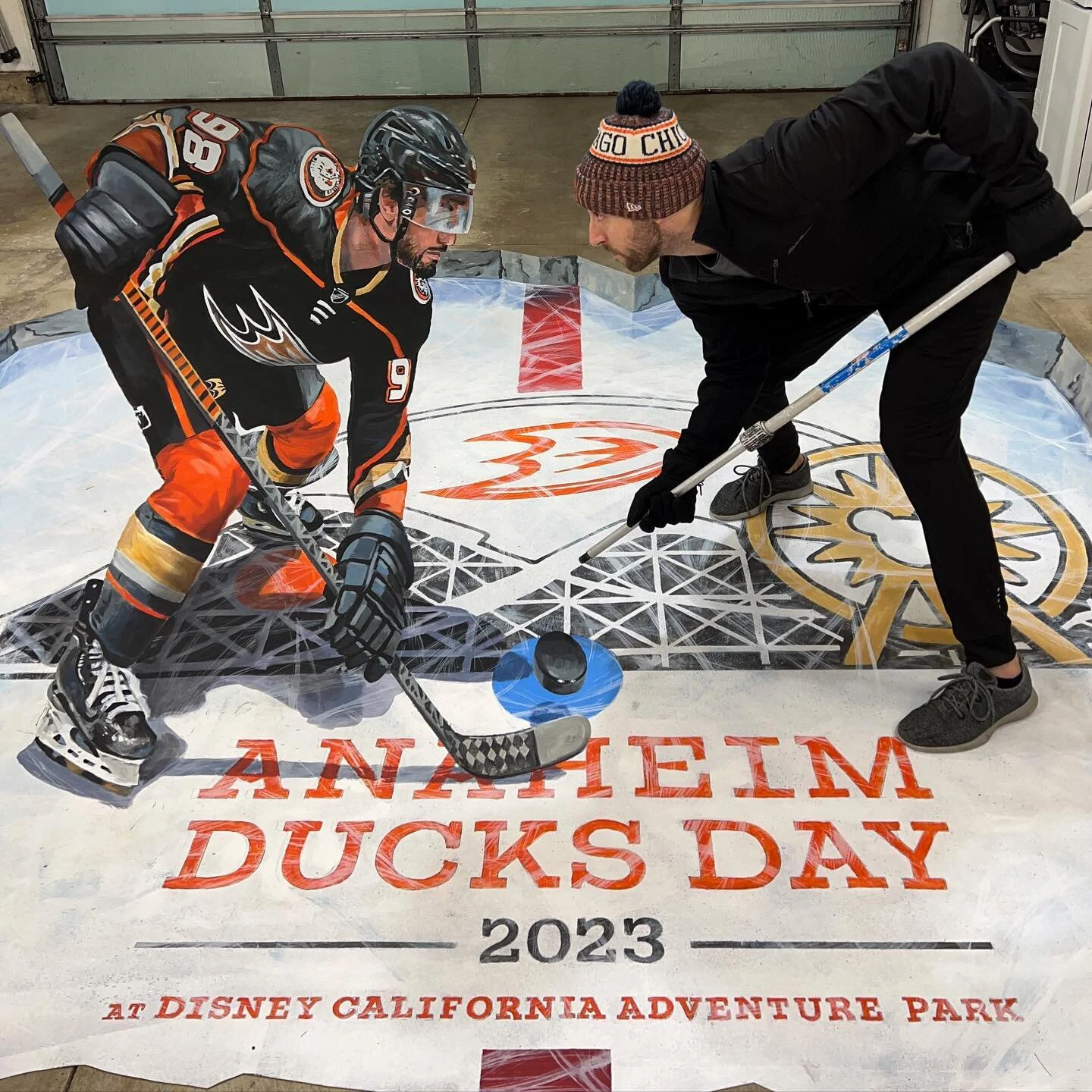 Yes it&rsquo;s just a paint roller extender and not a hockey stick but I still think I can win this face off 😎. This painting on vinyl was sent off to @disneyland for Anaheim Ducks Day. I hope a lot of people got to have fun with a real hockey stick
