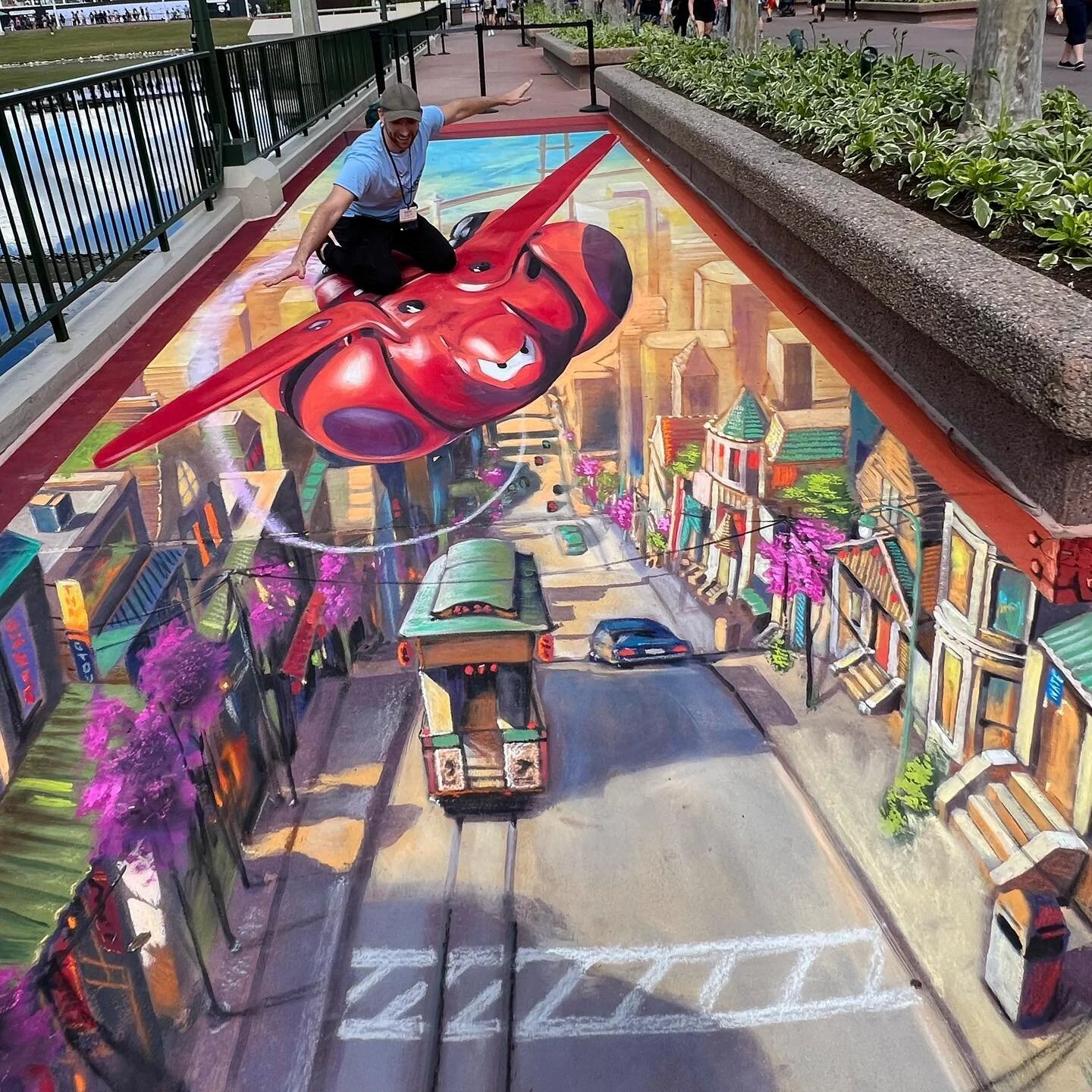 Learning to fly on Baymax in my new 3D chalk piece at EPCOT for the International Festival of the Arts!! #baymax #bighero6 #artfulepcot