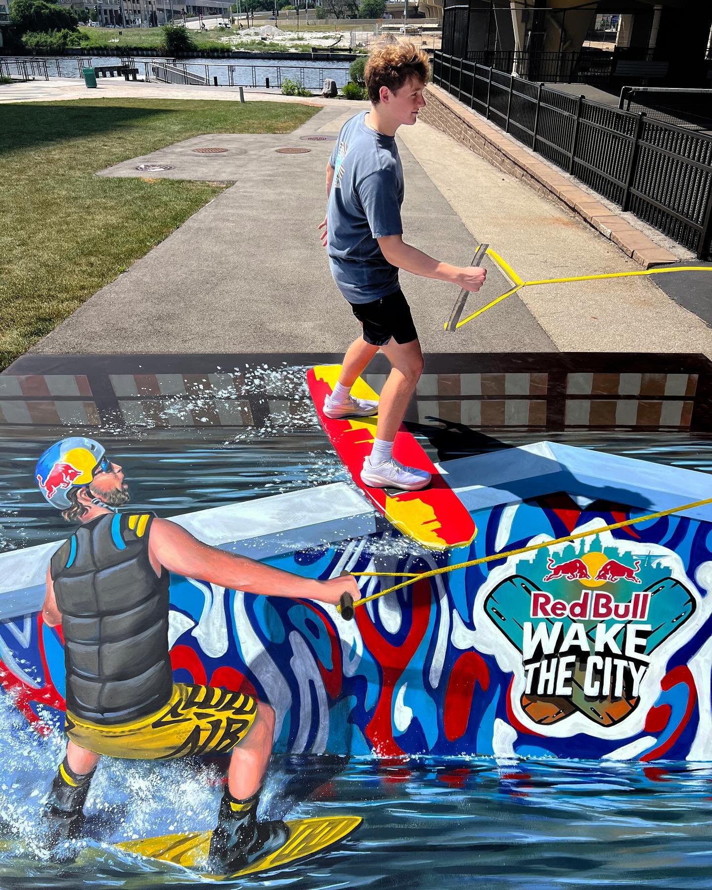Pretending like a pro wakeboarder in this new piece installed near the @milwaukeepublicmarket for @redbullusa This street painting is promoting next weekend&rsquo;s Wake the City event in Milwaukee.