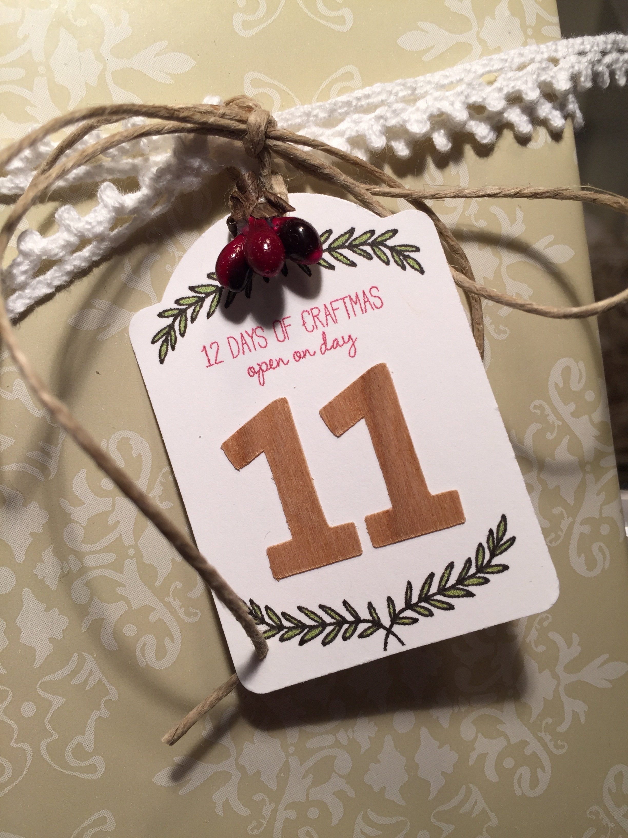 12 Days of crafts tags with a little berry and wood embellishments.