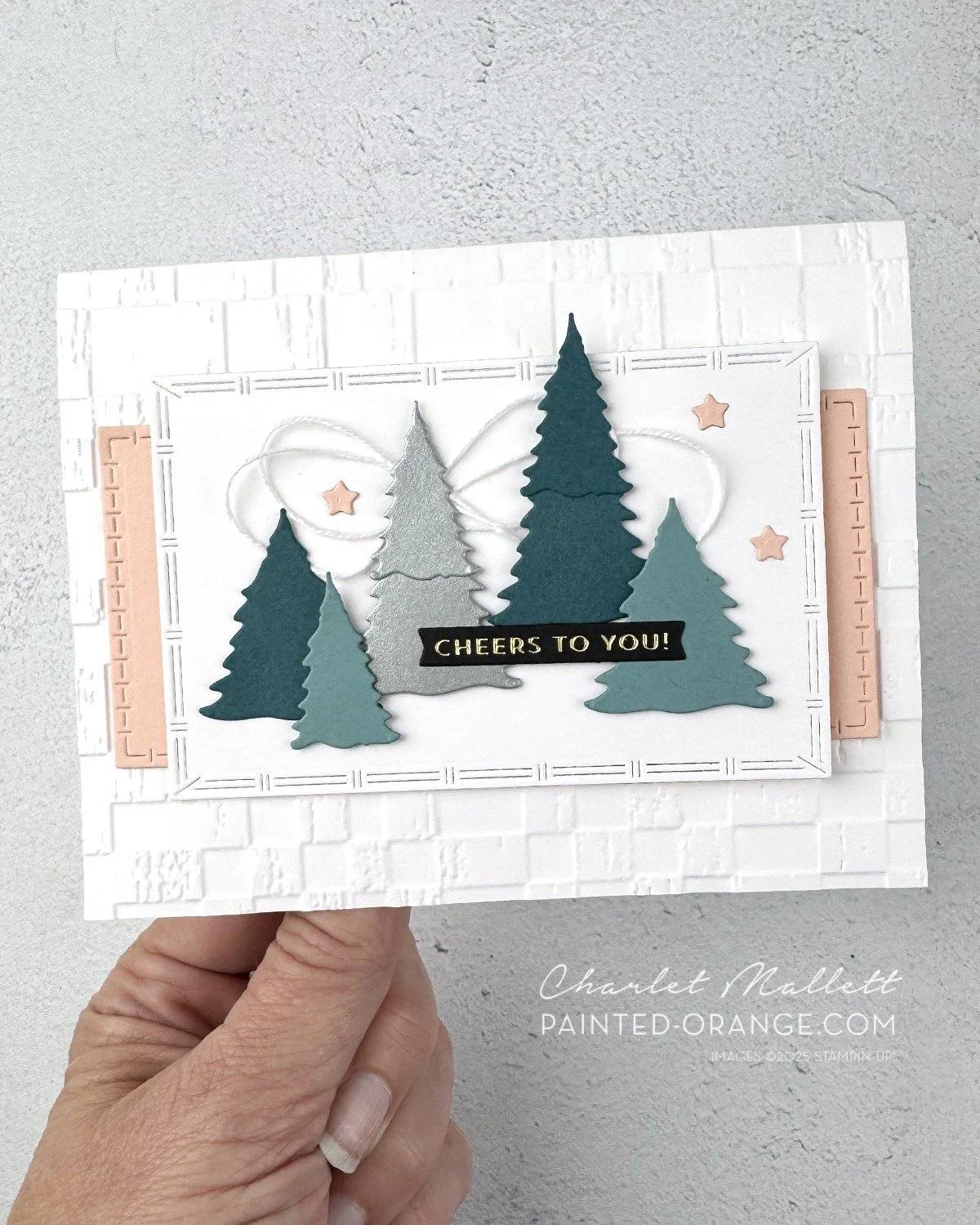 Just got my hands on the new LAYERED TAGS DIES which includes two perfect little trees ... On this card I used the two tree dies to create a row of trees in various shapes and heights. The trees are cut from various shades of blue/greens (Pretty Peac
