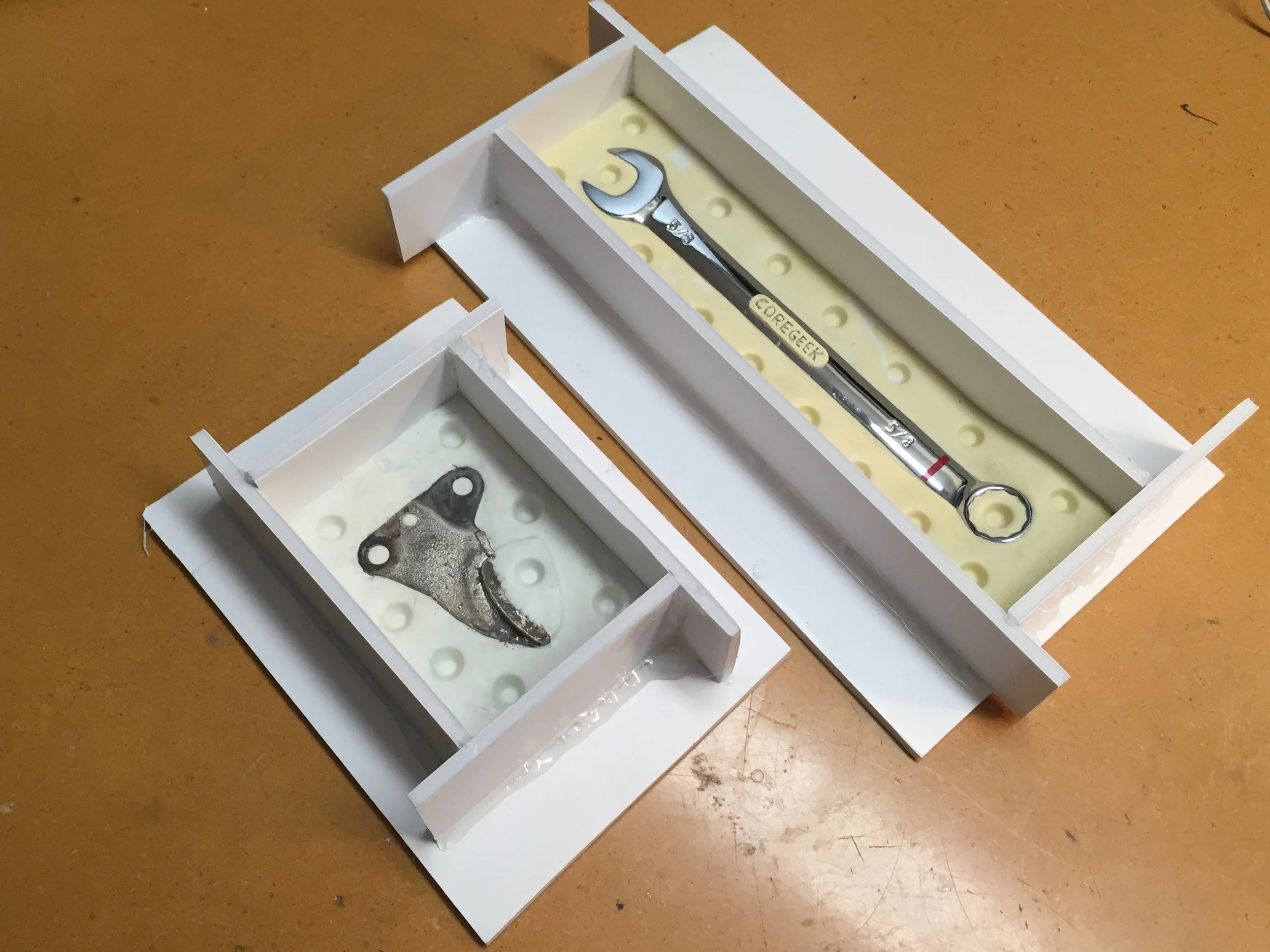 Mold boxes created with foamcore and hotglue. These are from another project, shown for Illustrative purposes only.