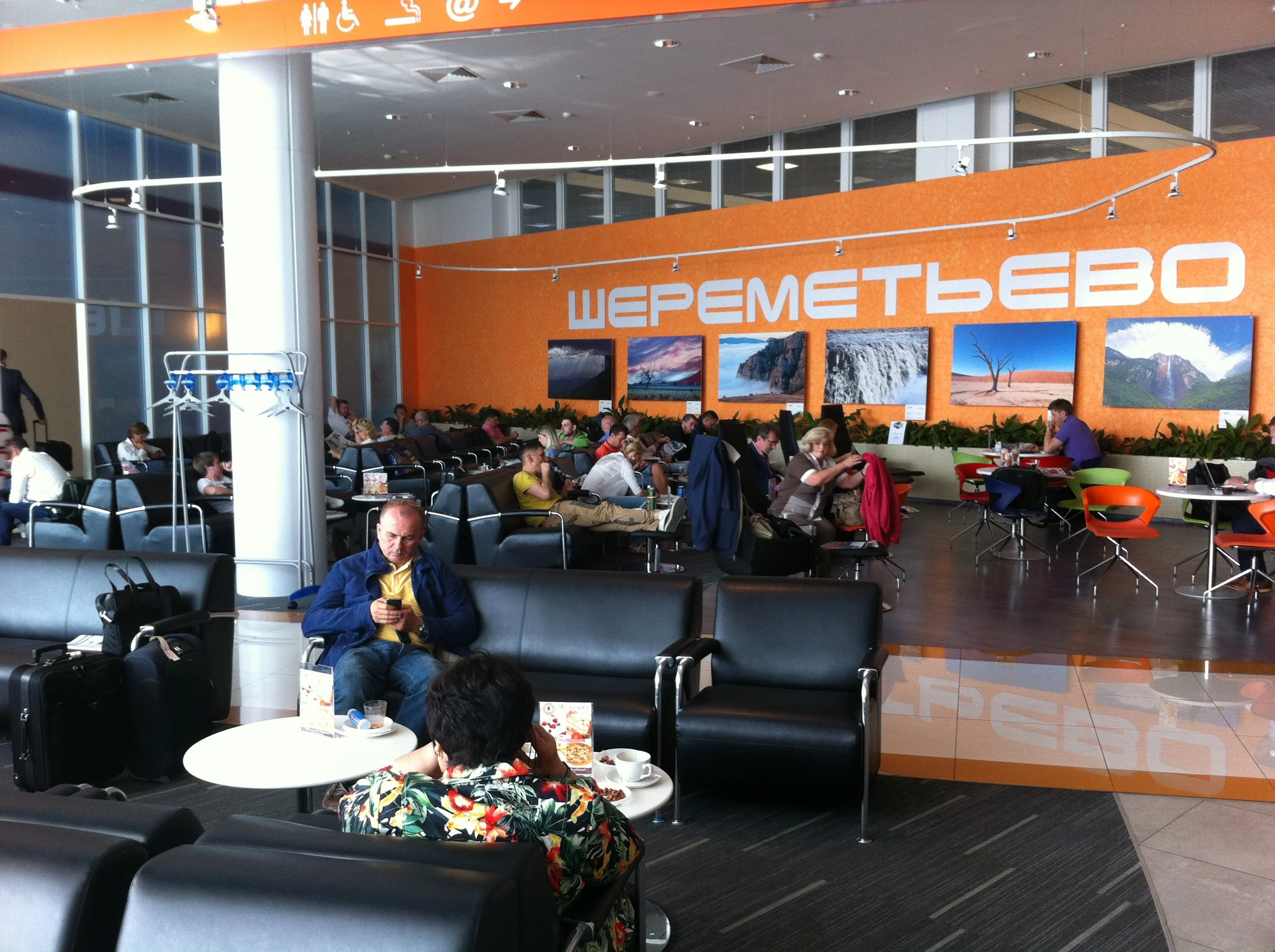 passengers relaxing in Sheremetyevo airport's business lounge