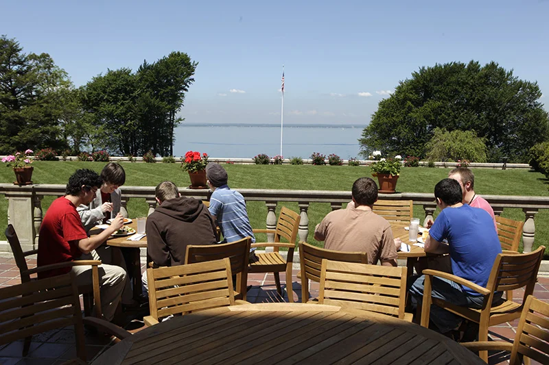 Students enjoying lunch on the back patio. 