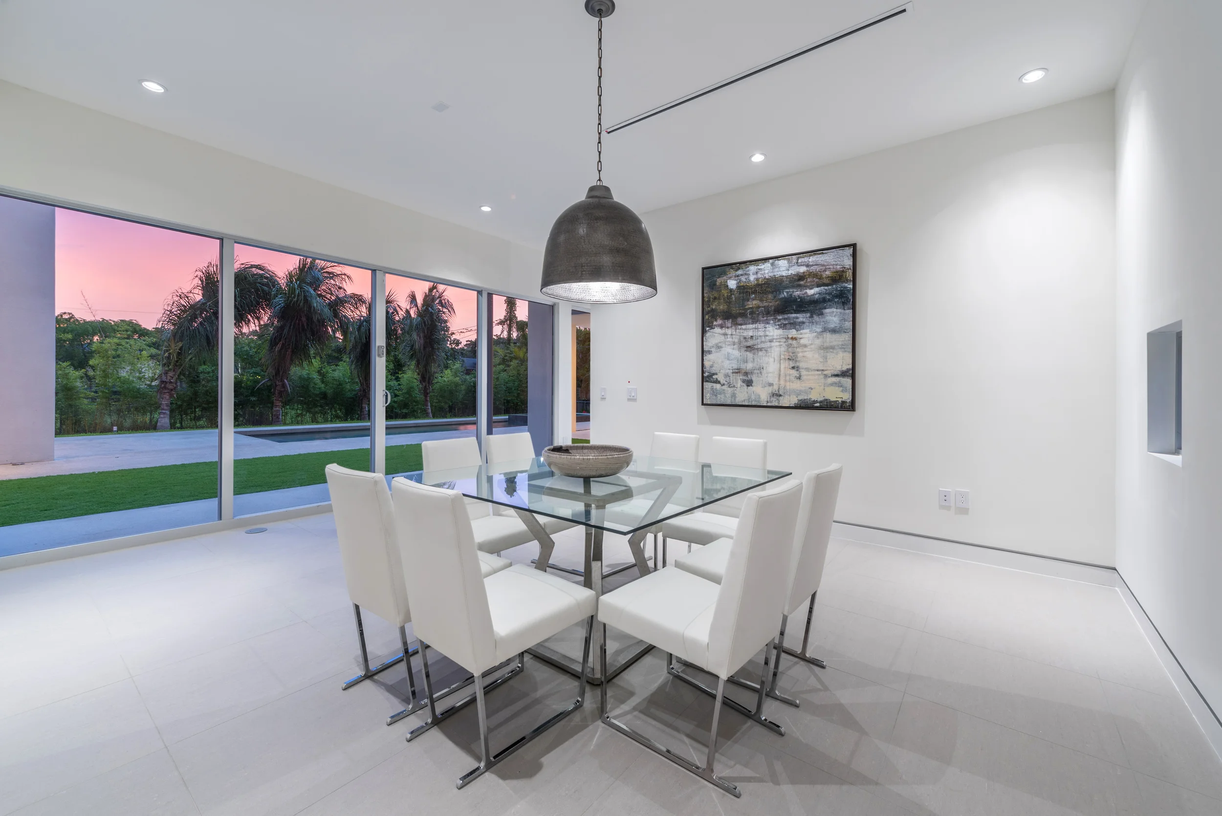 The Setting Homes Plum House Miami Florida Interior Dining Room Dusk TARIS Real Estate