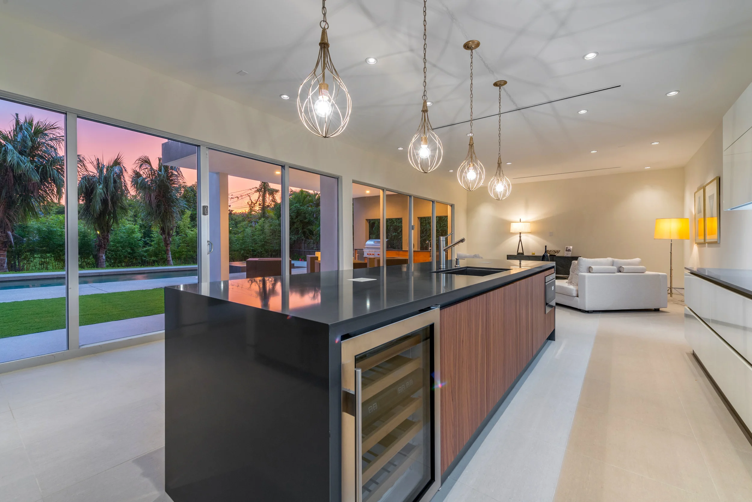 The Setting Homes Plum House Miami Florida Interior Kitchen Dusk TARIS Real Estate