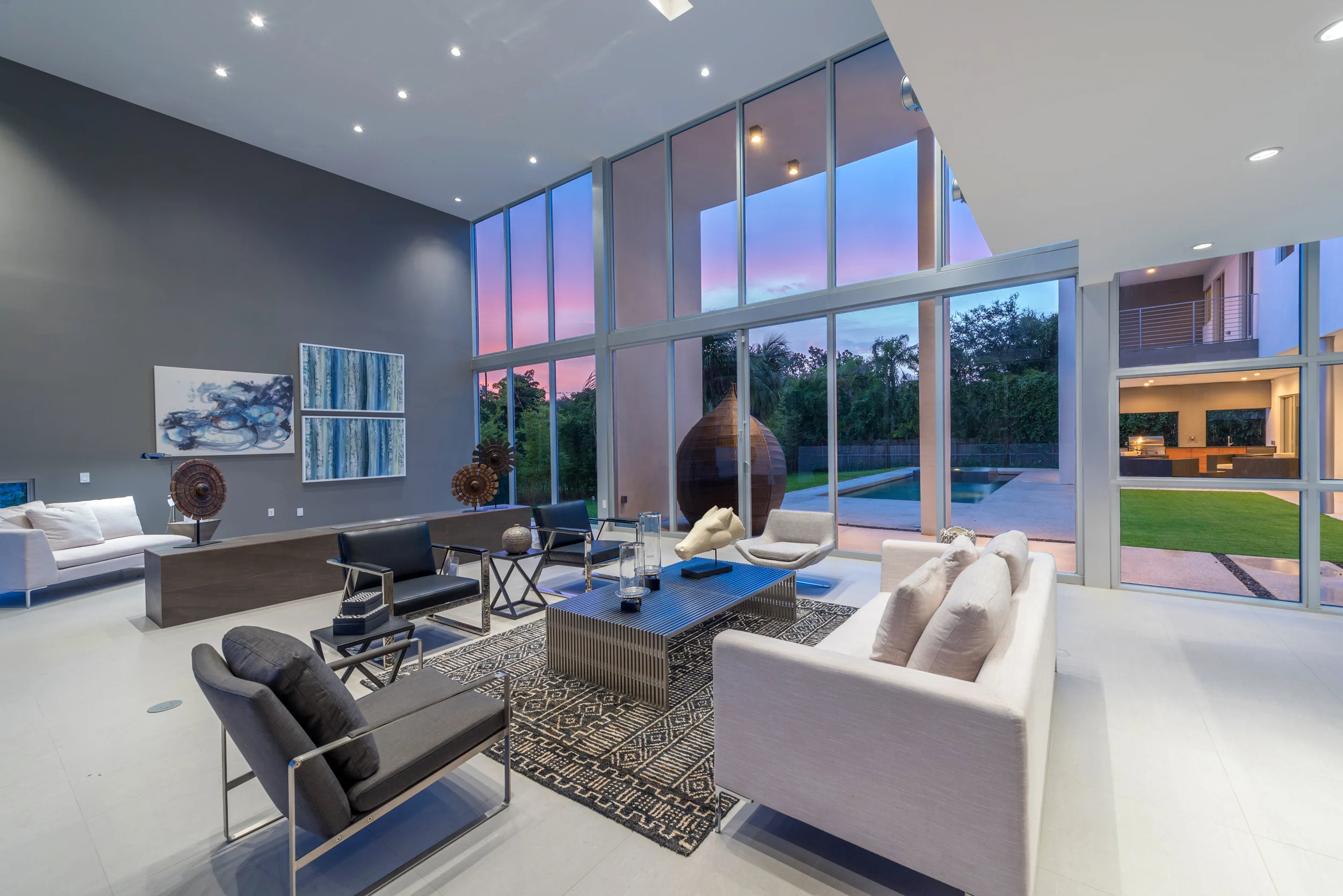The Setting Homes Plum House Miami Florida Interior Living Room Dusk TARIS Real Estate