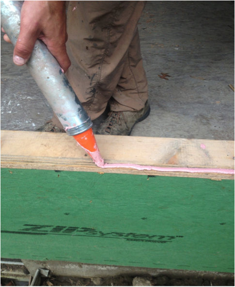 Figure 1: Applying the Joint & Seam Filler to window rough opening
