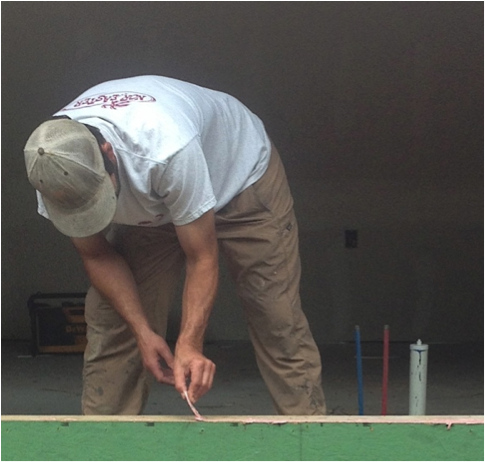 Figure 2: Spreading the Joint & Seam Filler into the seams