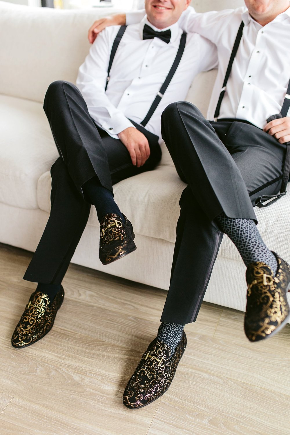 gold and black groom shoes