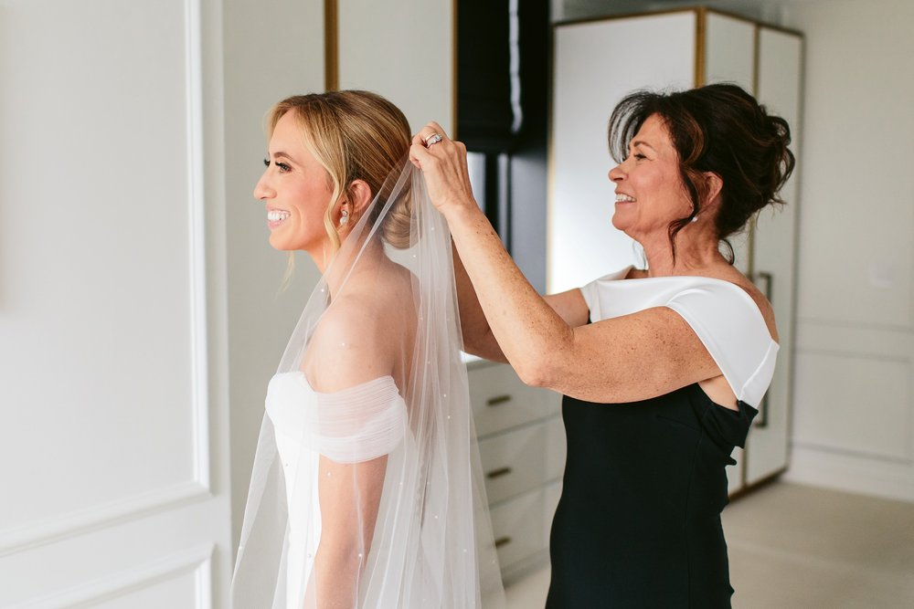 putting veil on for chicago wedding