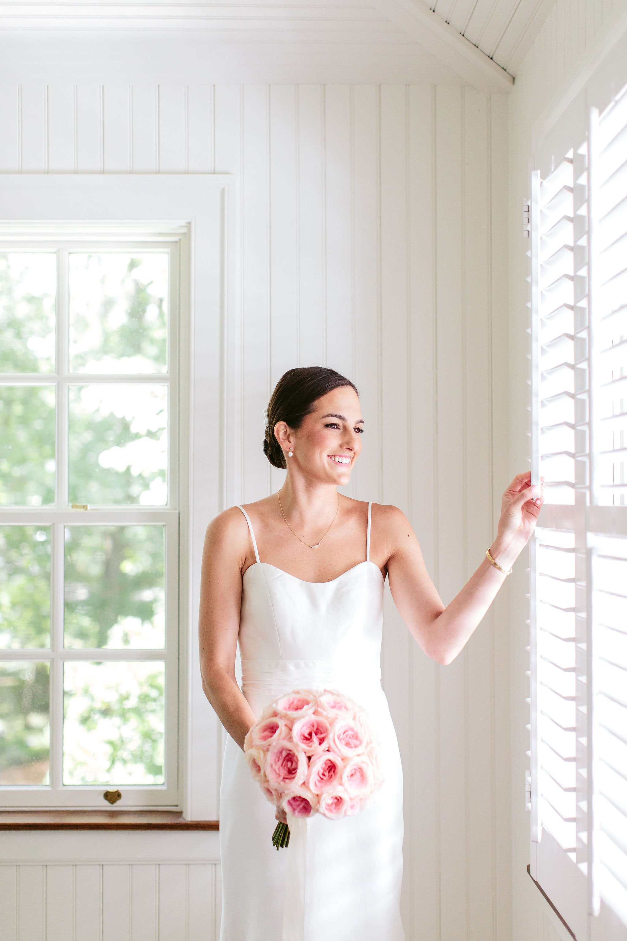bridal portrait with pink bouquet