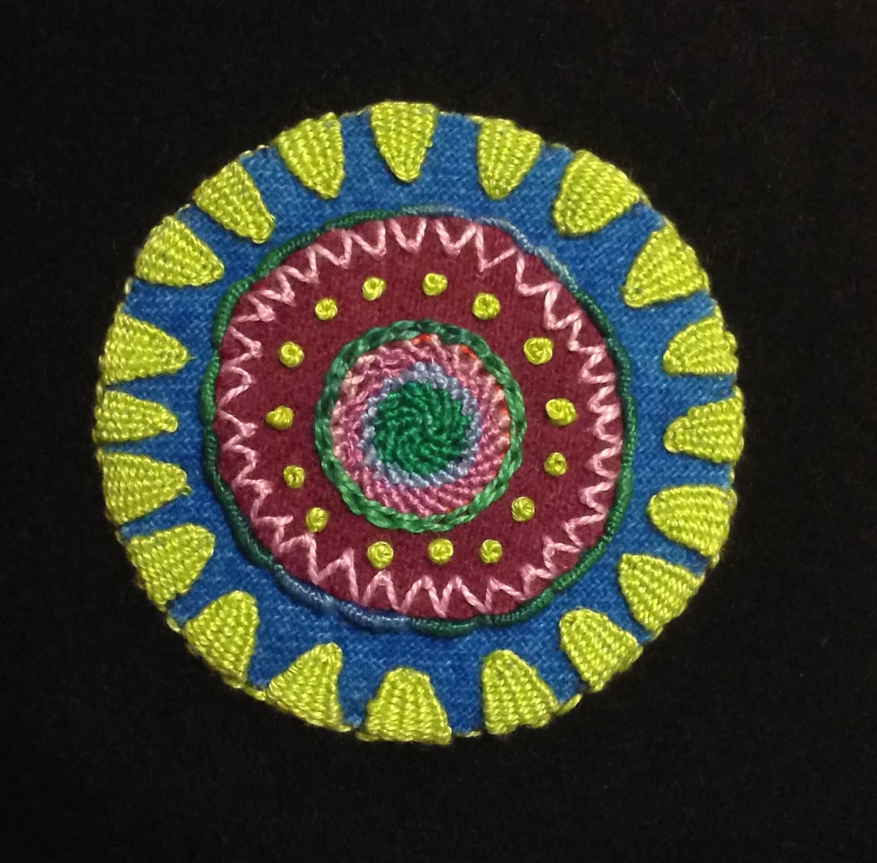 The Woven Picots are the triangular stitches on the edge of the circle.