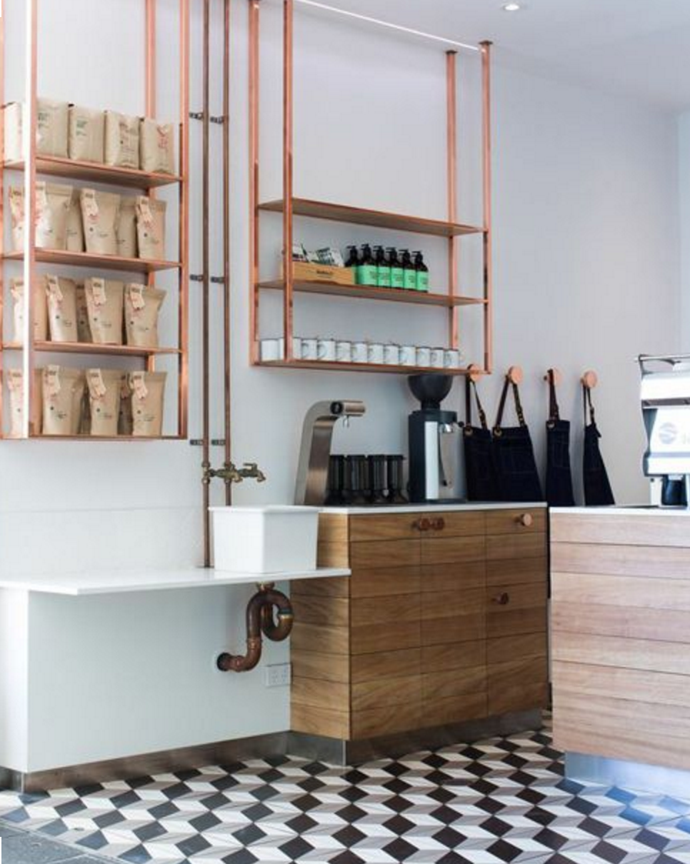 Modern industrial shelving with soft, organic materials