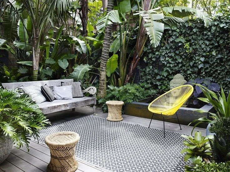 Vertical green walls with a clean, contemporary graphic flooring