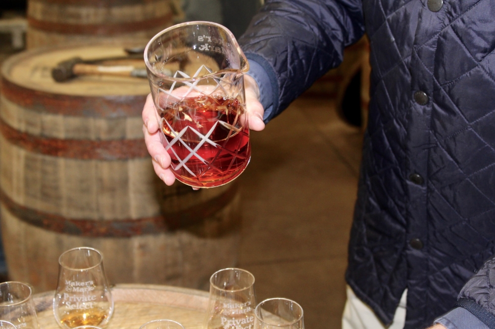 Rob Samuels pours Maker's 46 samples for the press.