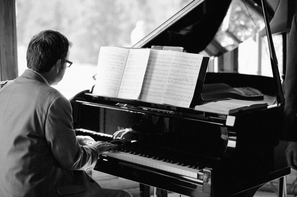 Playing piano for his niece's wedding