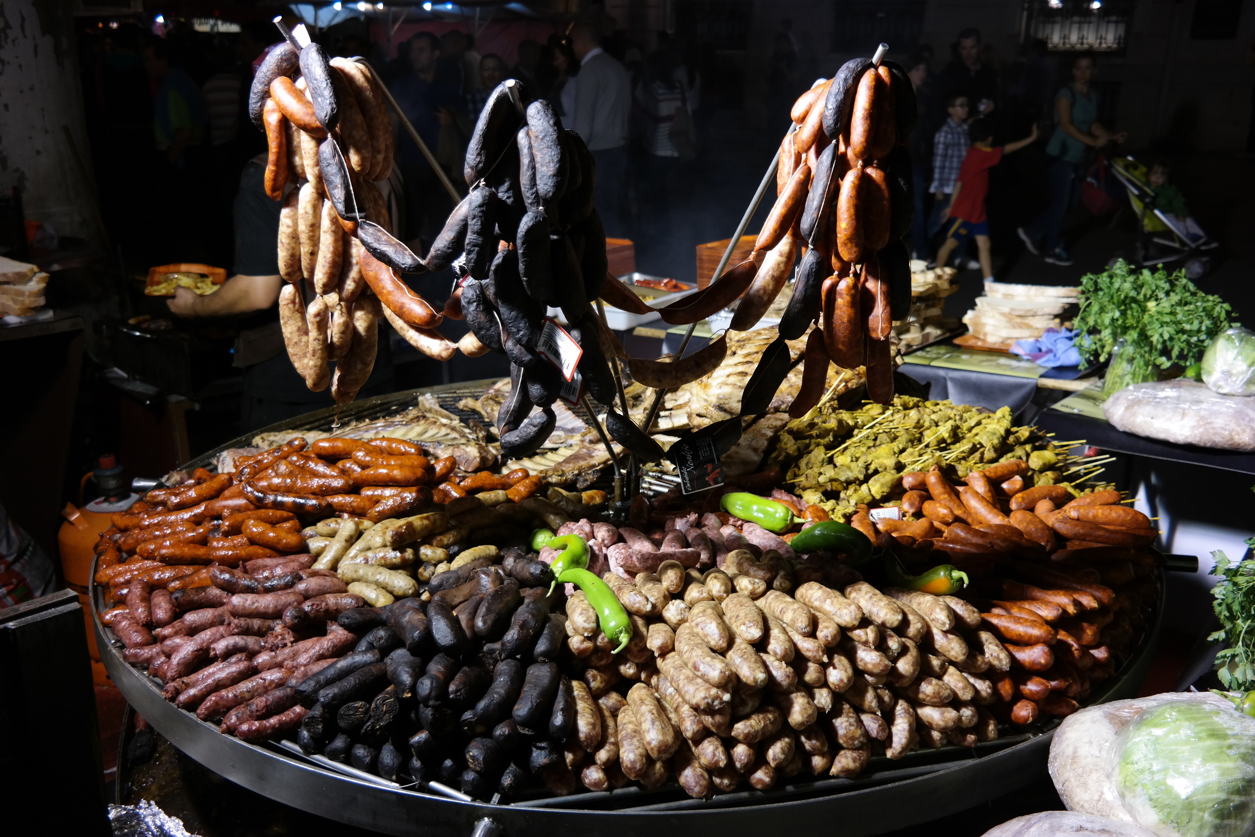 I don't know what's in all of these sausages, but I can tell you I'm not planning on eating the dark one--it's called blood sausage for a reason. :)