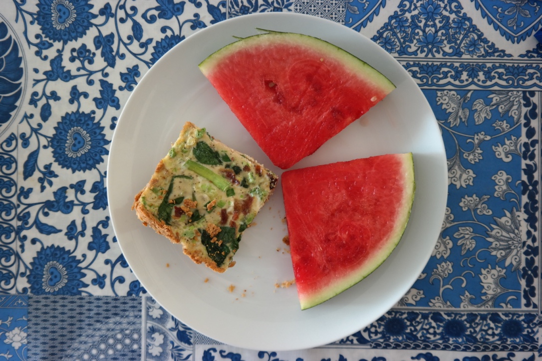Spinach and bacon quiche with an almond meal crust , accompanied by fresh, juicy watermelon! This quiche was OK, but I wouldn't recommend the recipe, so I'm going to look for another one next time I make quiche.