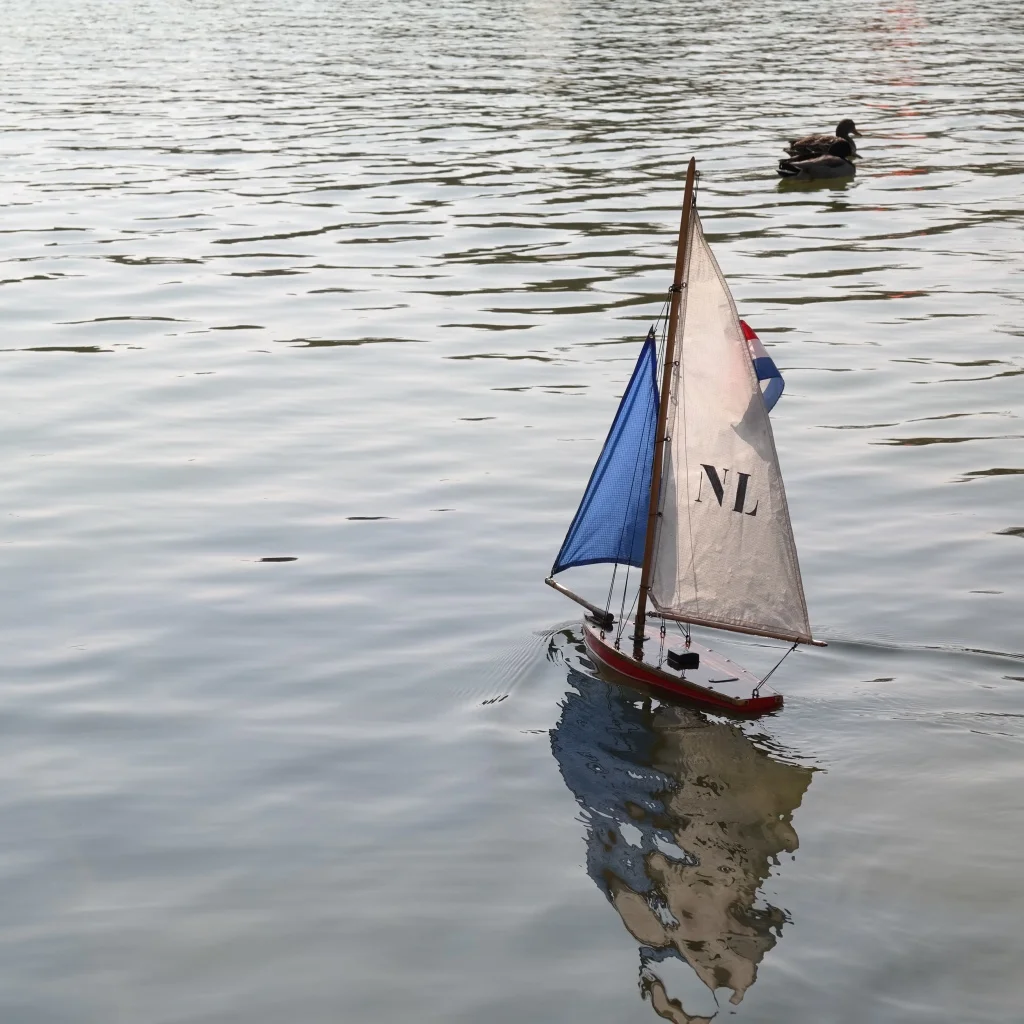 Adorable little French children were sailing their small boats in one of the fountains. 