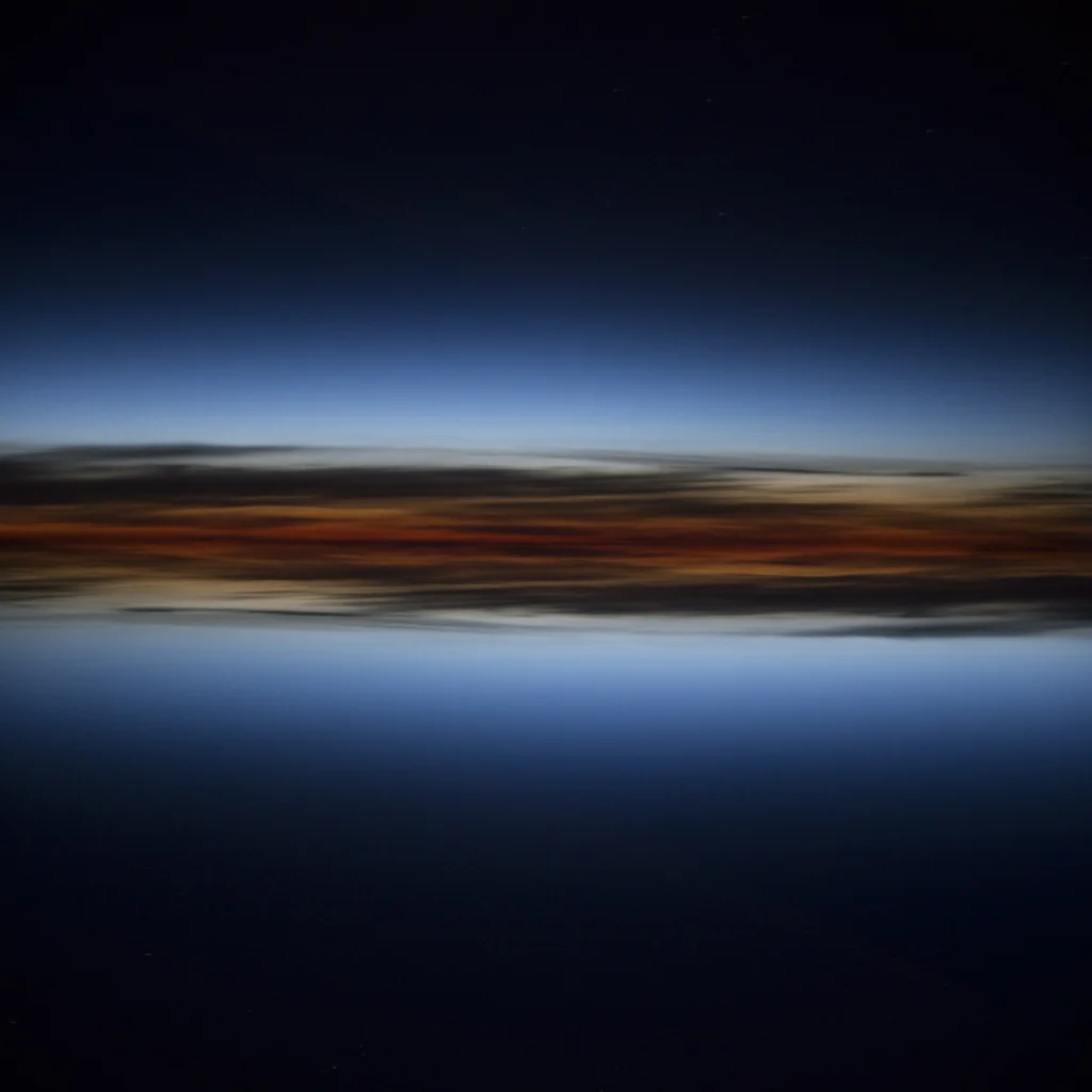 Strangers in this flying container surround me,they know nothing of me and I know nothing of them. There is no light on the ground though it seems we are closing on a citycalled Arkhangelsk. Along the Barents Sea we travel, the light is be…