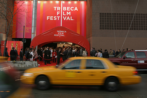 Taxi_passes_TFF_Open_Ceremony_Red_Carpet_01-cropped.png