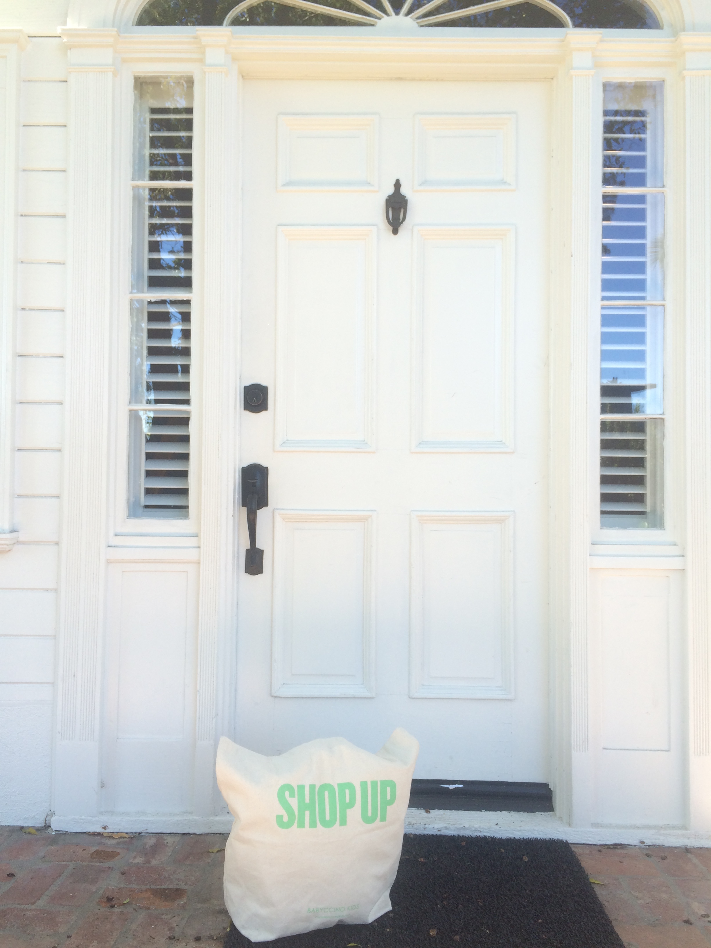 ShopUp tote outside Lombardi House. The magic happens April 10-11!