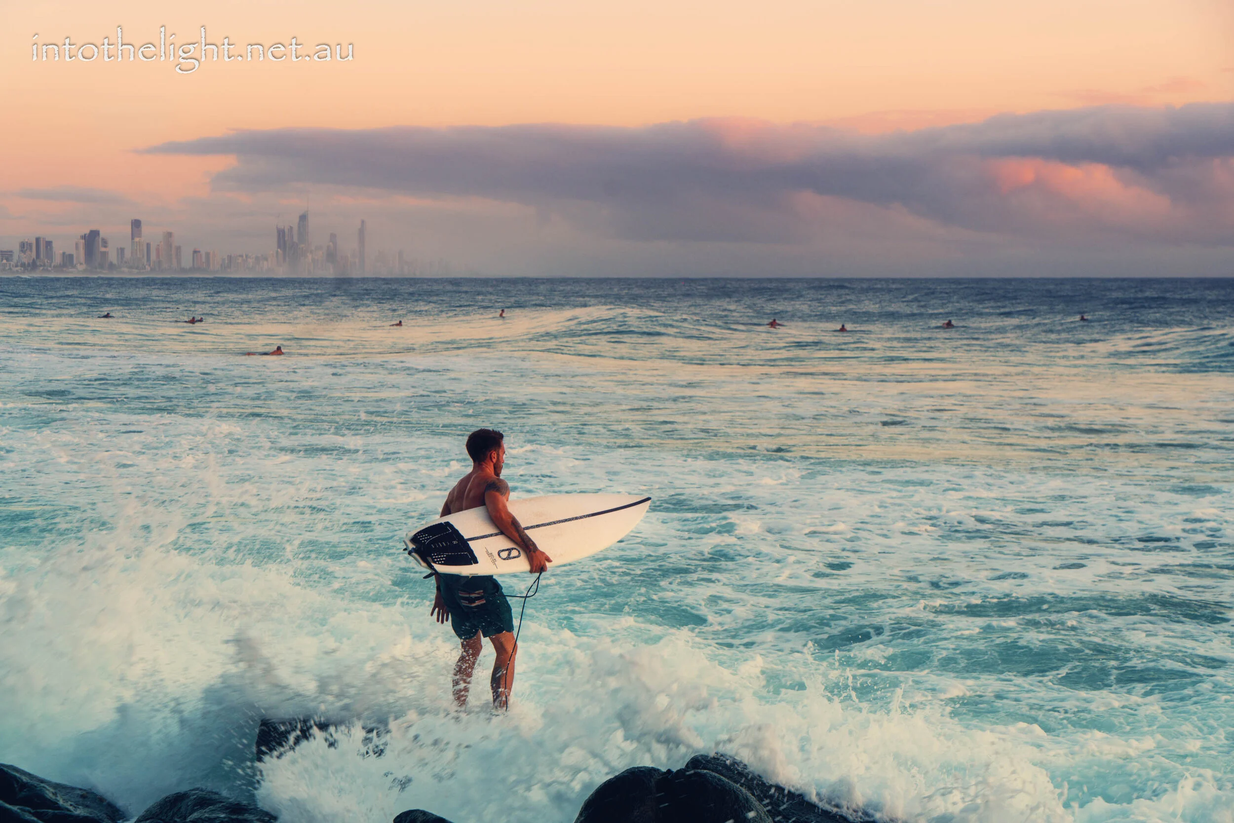 Surfer on the rocks-burleigh (1 of 1).jpg