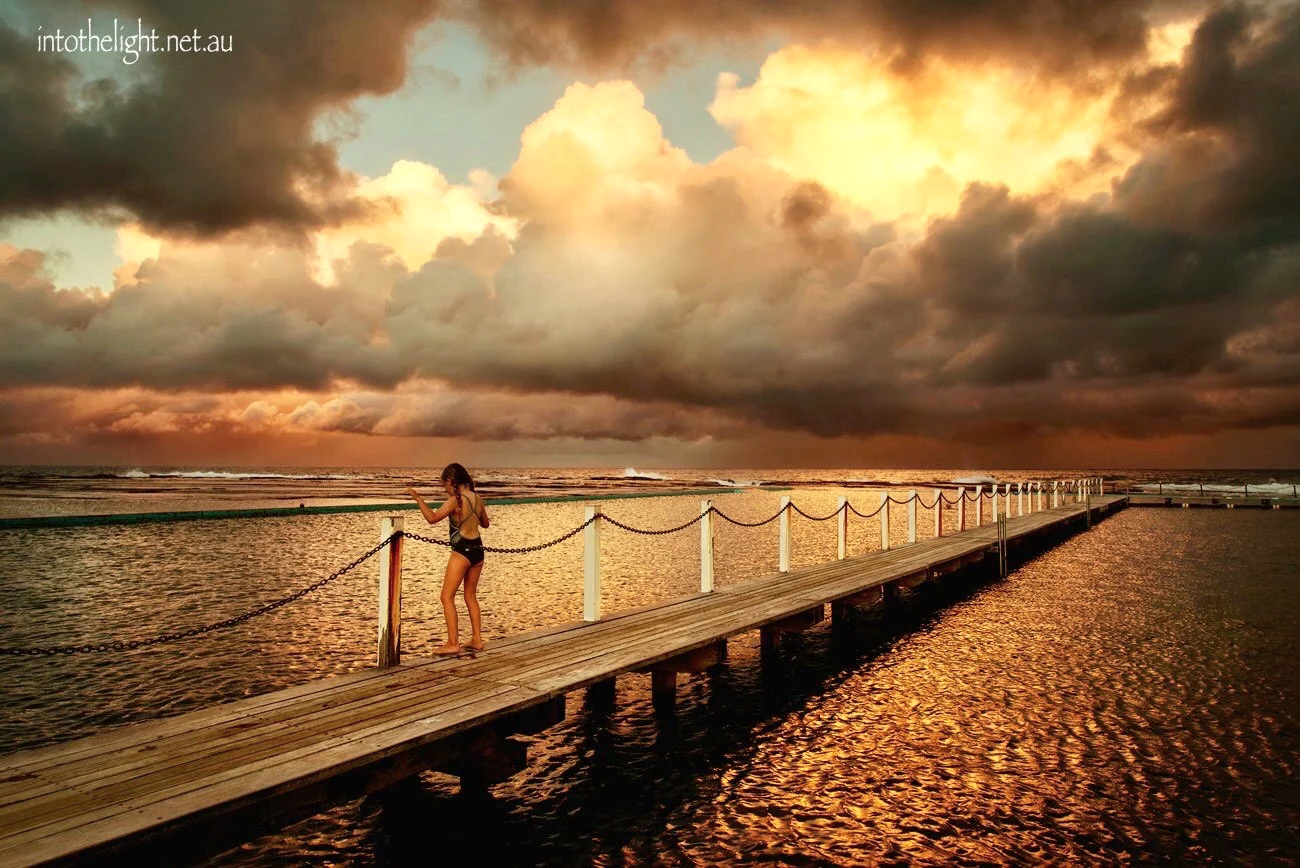 Girl In The Sunset Storm