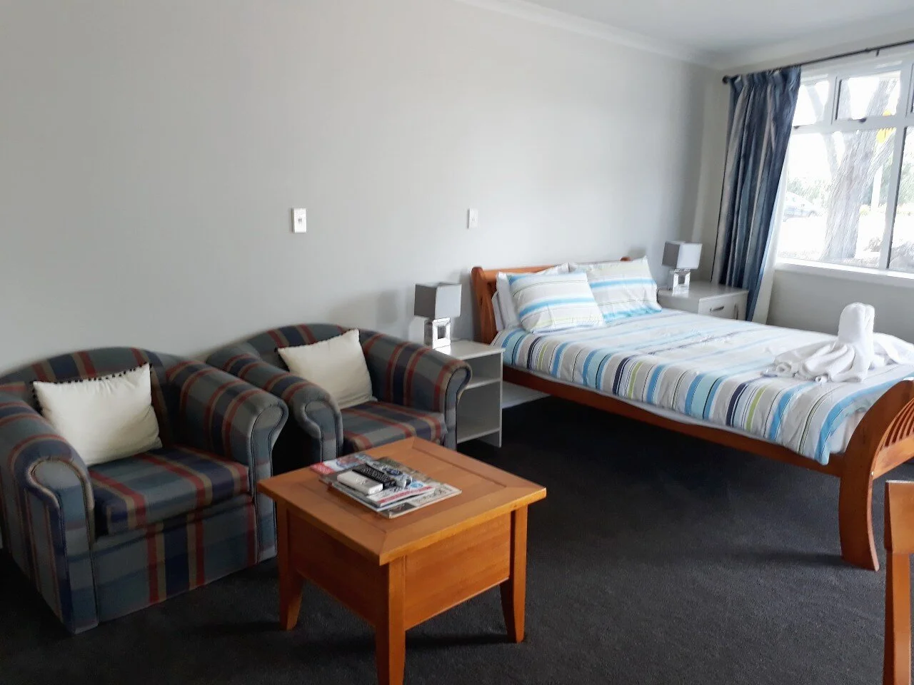 Room 5 Tk Front unit chairs table and Queen Bed.jpg