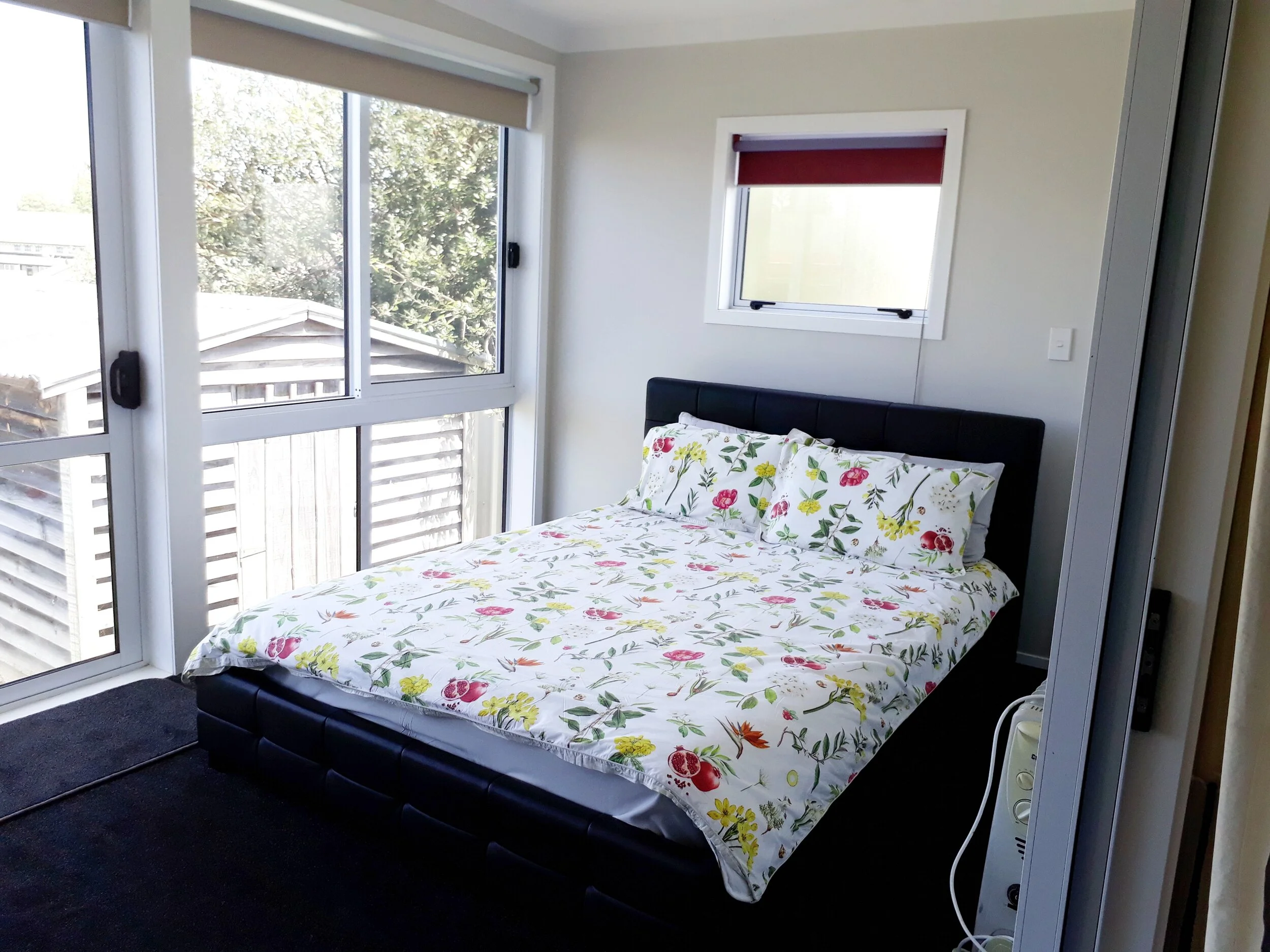 Room 6 TK Back unit back bedroom side with Queen bed.jpg