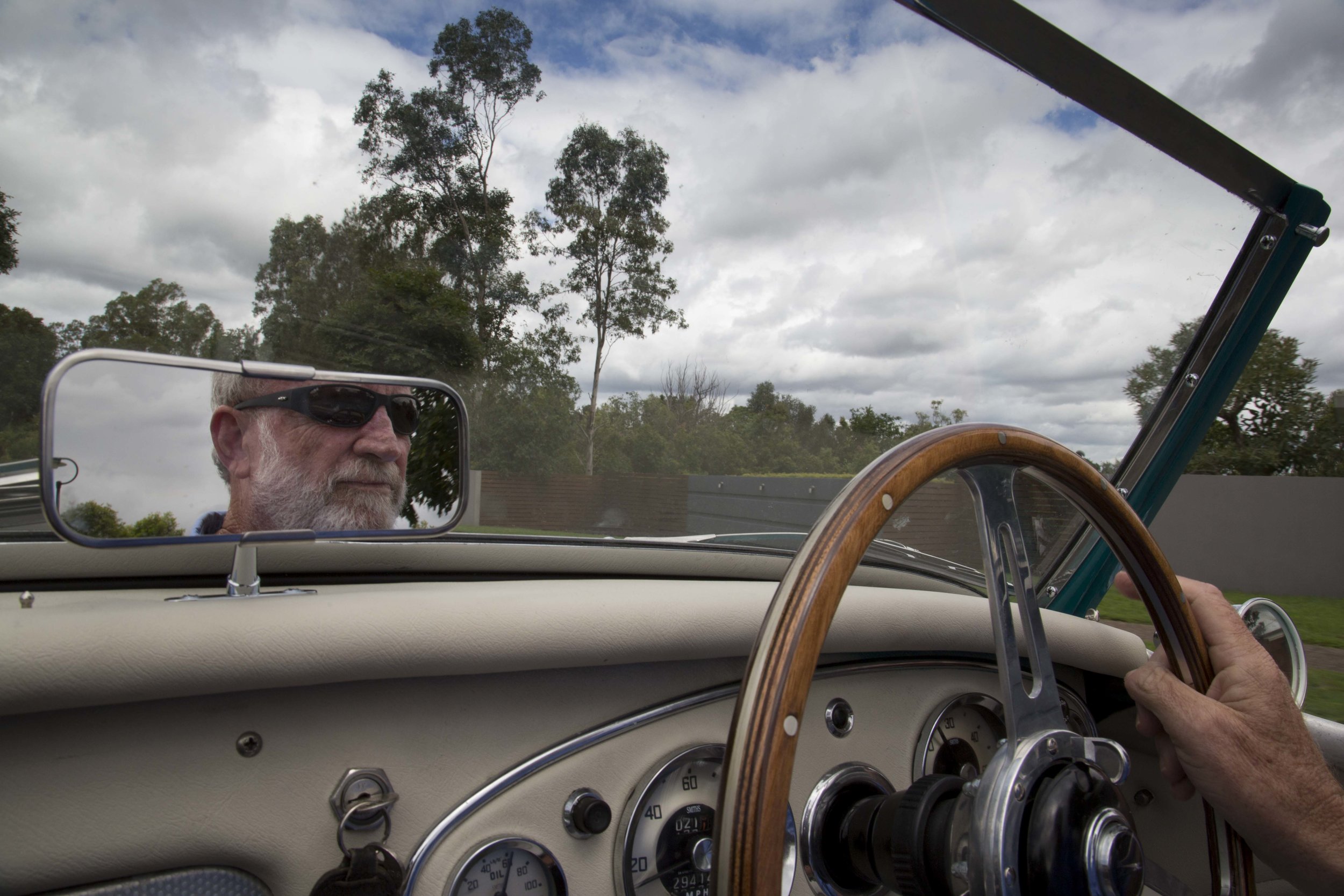  Writer Frank Robson behind the wheels of a 1958 Austin Healey ONE HUNDRED SIX 