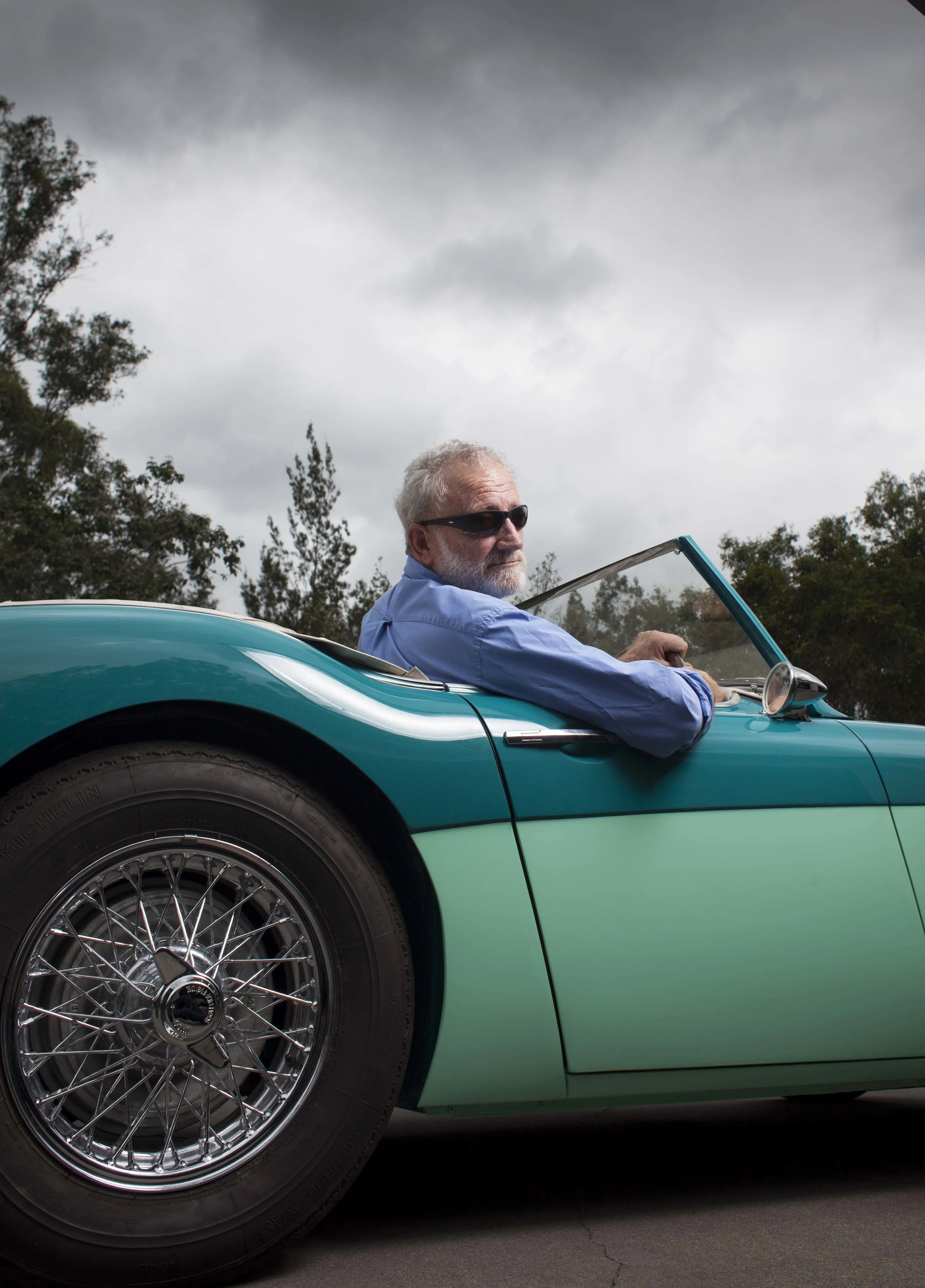 Writer Frank Robson behind the wheels of a 1958 Austin Healey ONE HUNDRED SIX