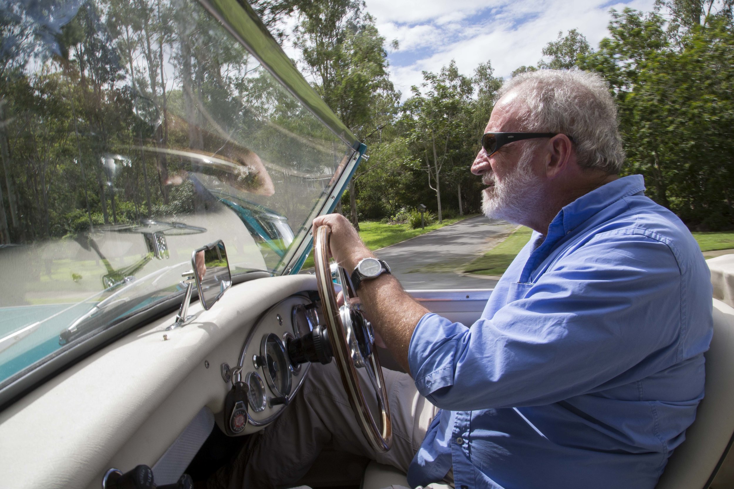  Writer Frank Robson behind the wheels of a 1958 Austin Healey ONE HUNDRED SIX 