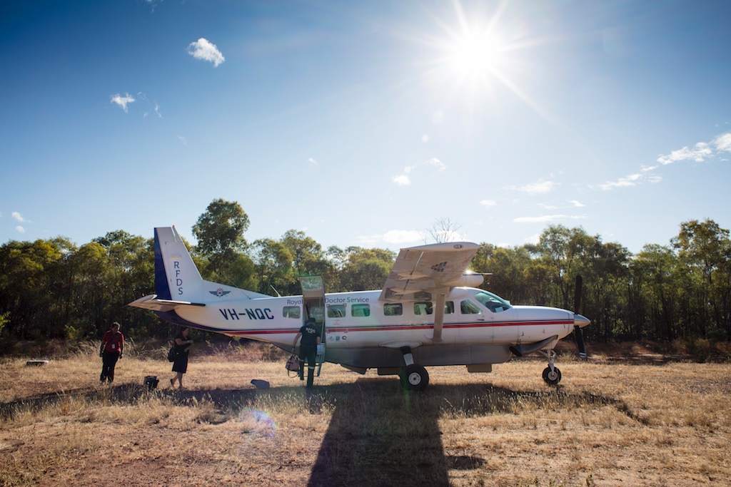  Royal Flying Doctor Service Clinic at Gilberton Station, Qld... RFDS Pilot Ross Thomas loading the aircraft for departure from the station 