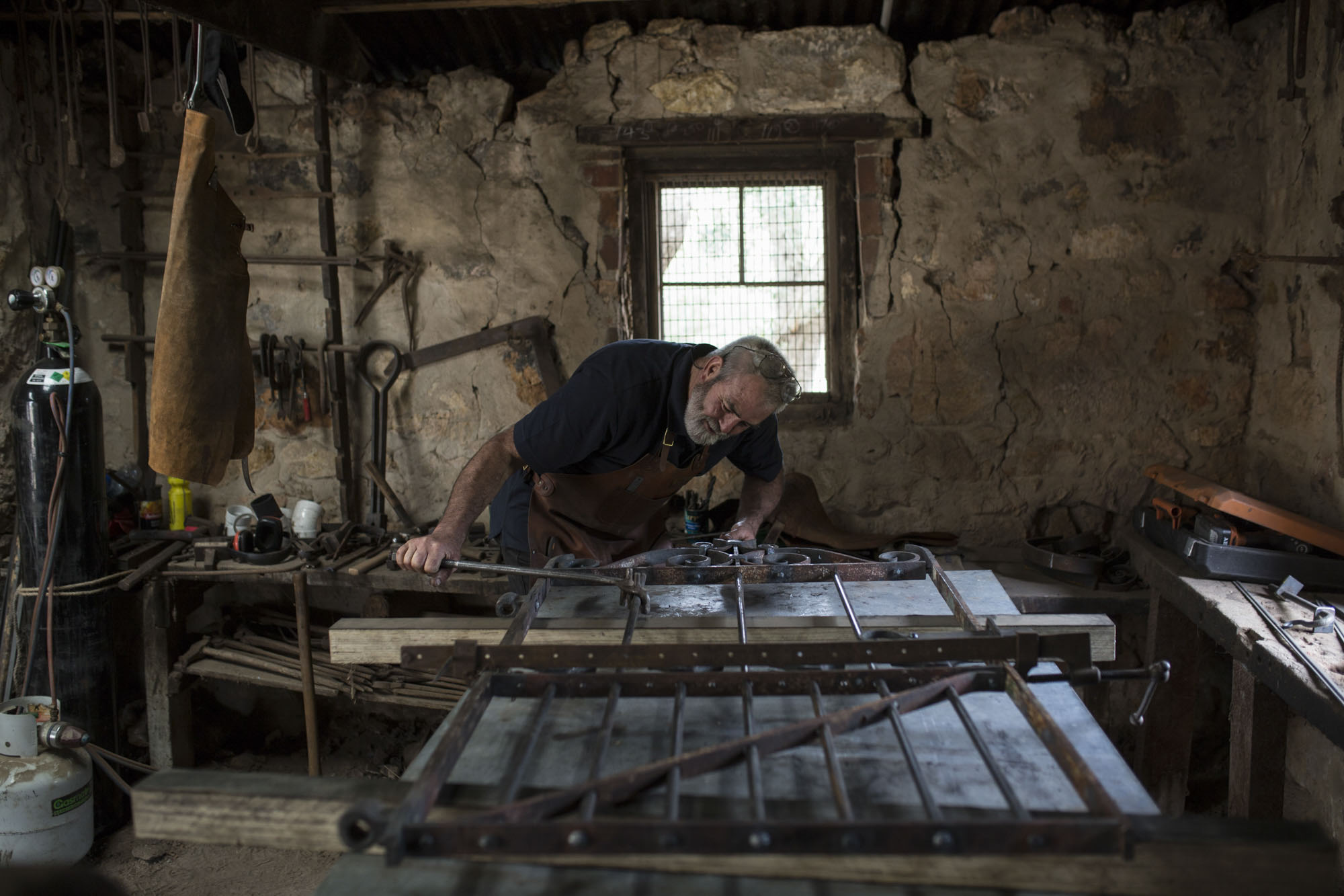  “CLICK GO THE SHEARS – FOR 175 YEARS” EVENT at Bungaree Station, South Australia.
Artistic Blacksmiths Association of SA
Chris Fuller working on a new Farm Gate for the Homestead 